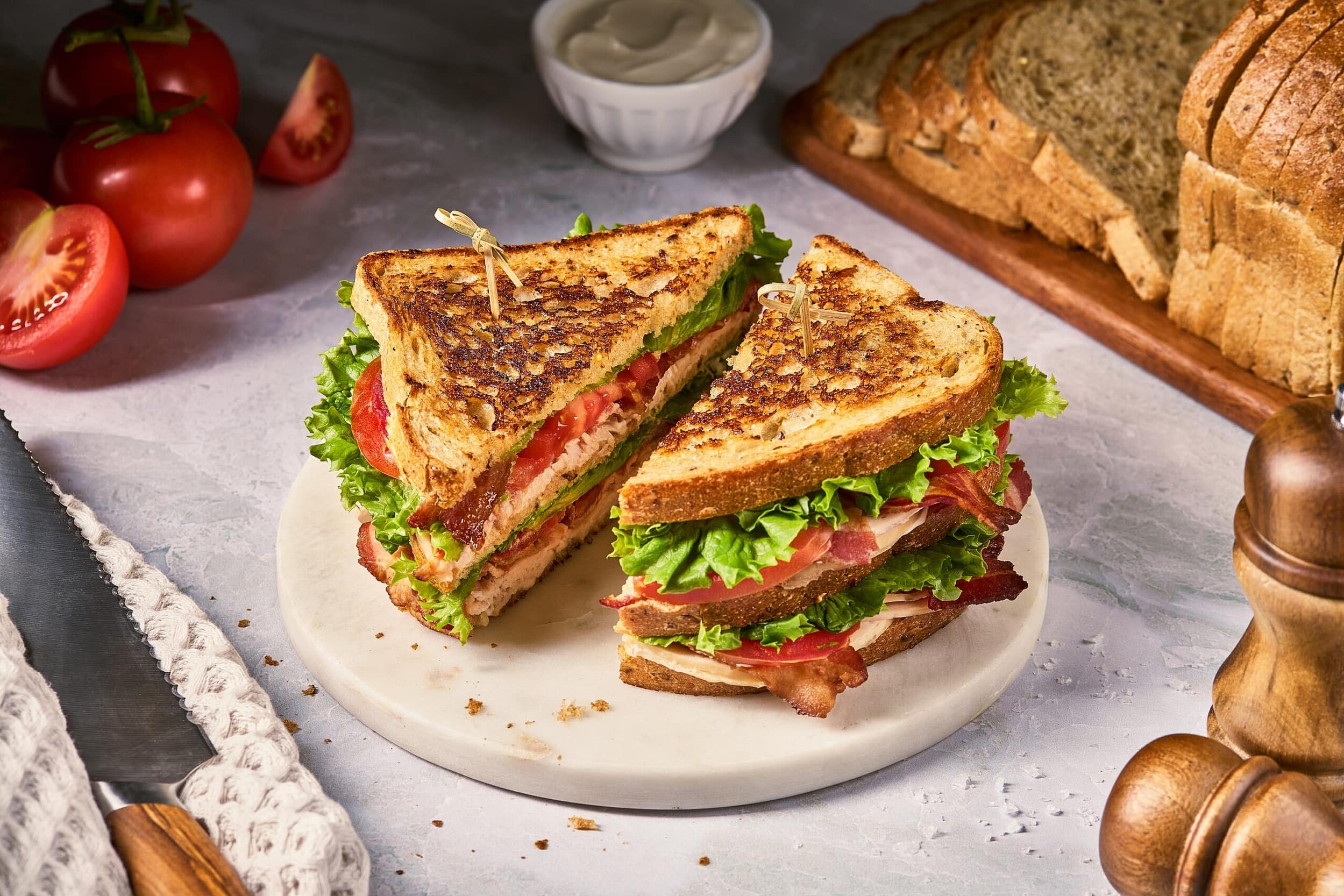 club sandwich stacked high on plate